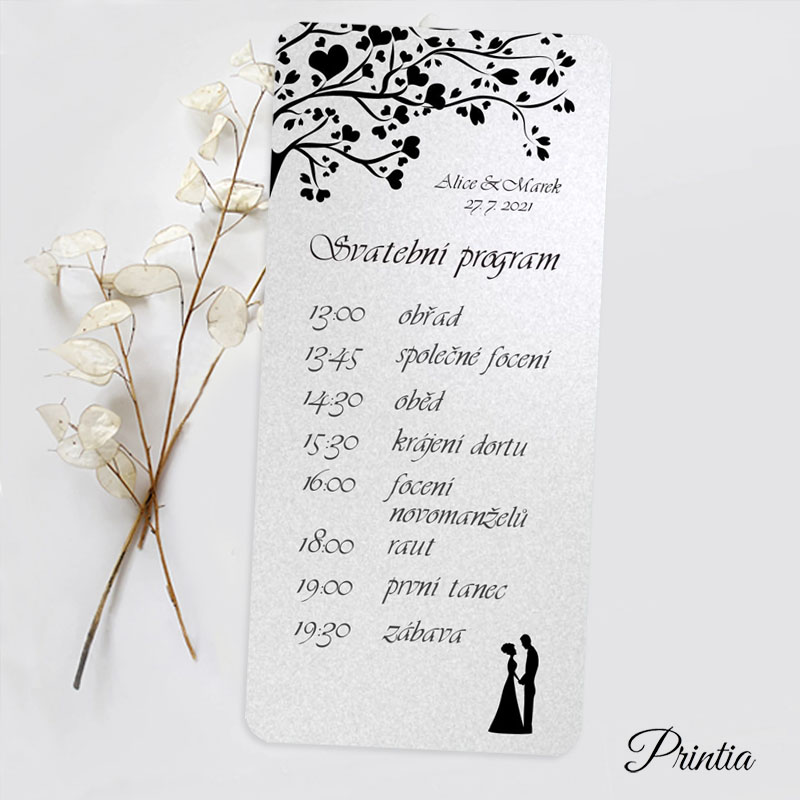 Wedding program with couple silhouettes