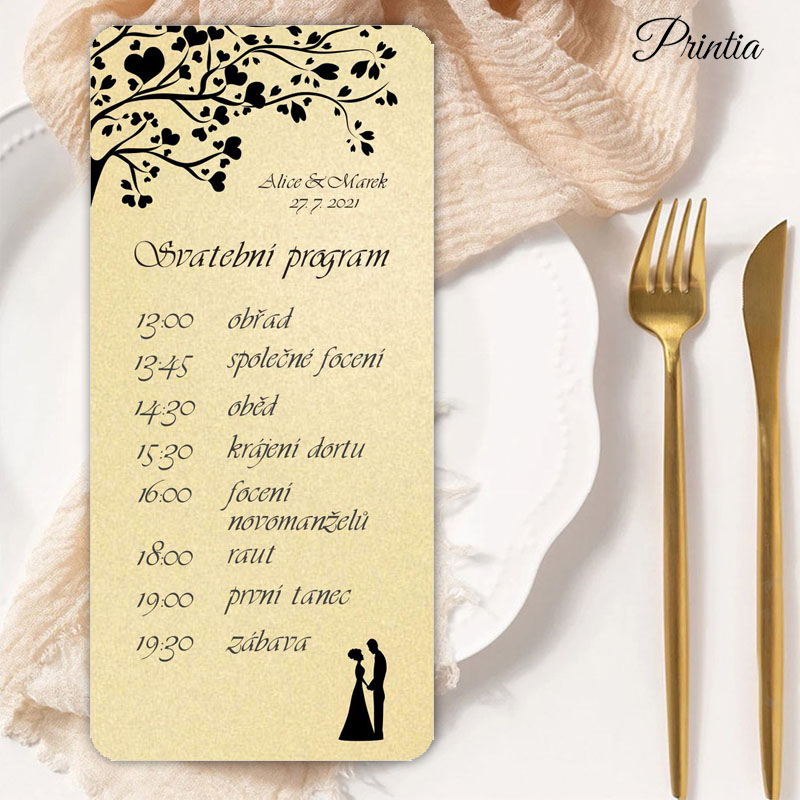Wedding program with couple silhouettes