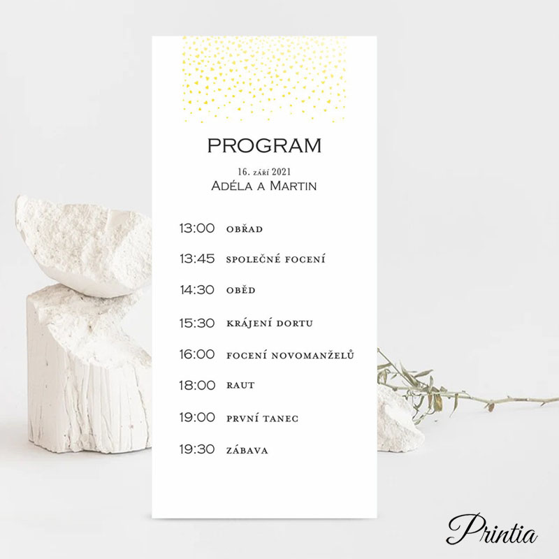 Wedding program with golden hearts