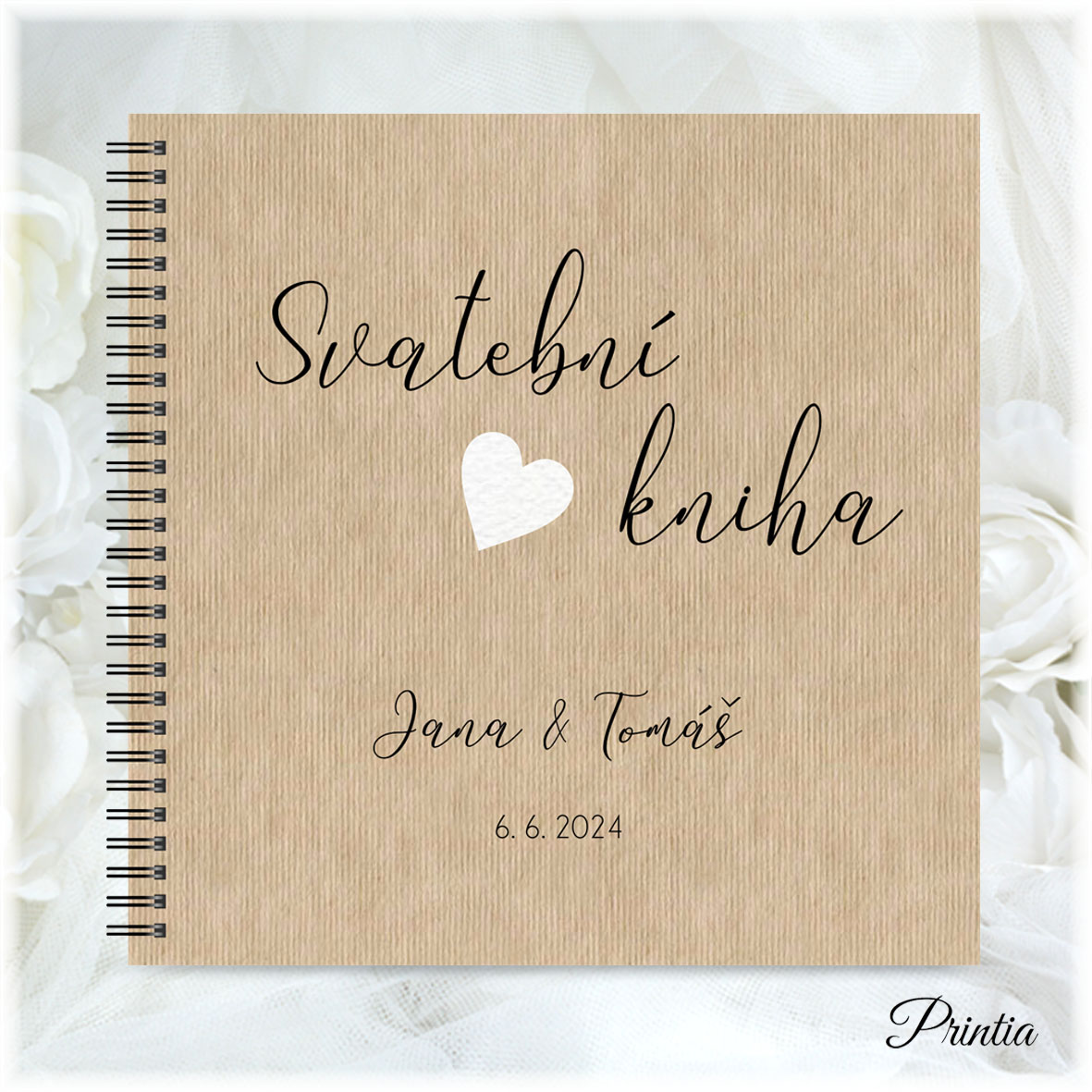 Wedding book on light kraft paper with a white heart 