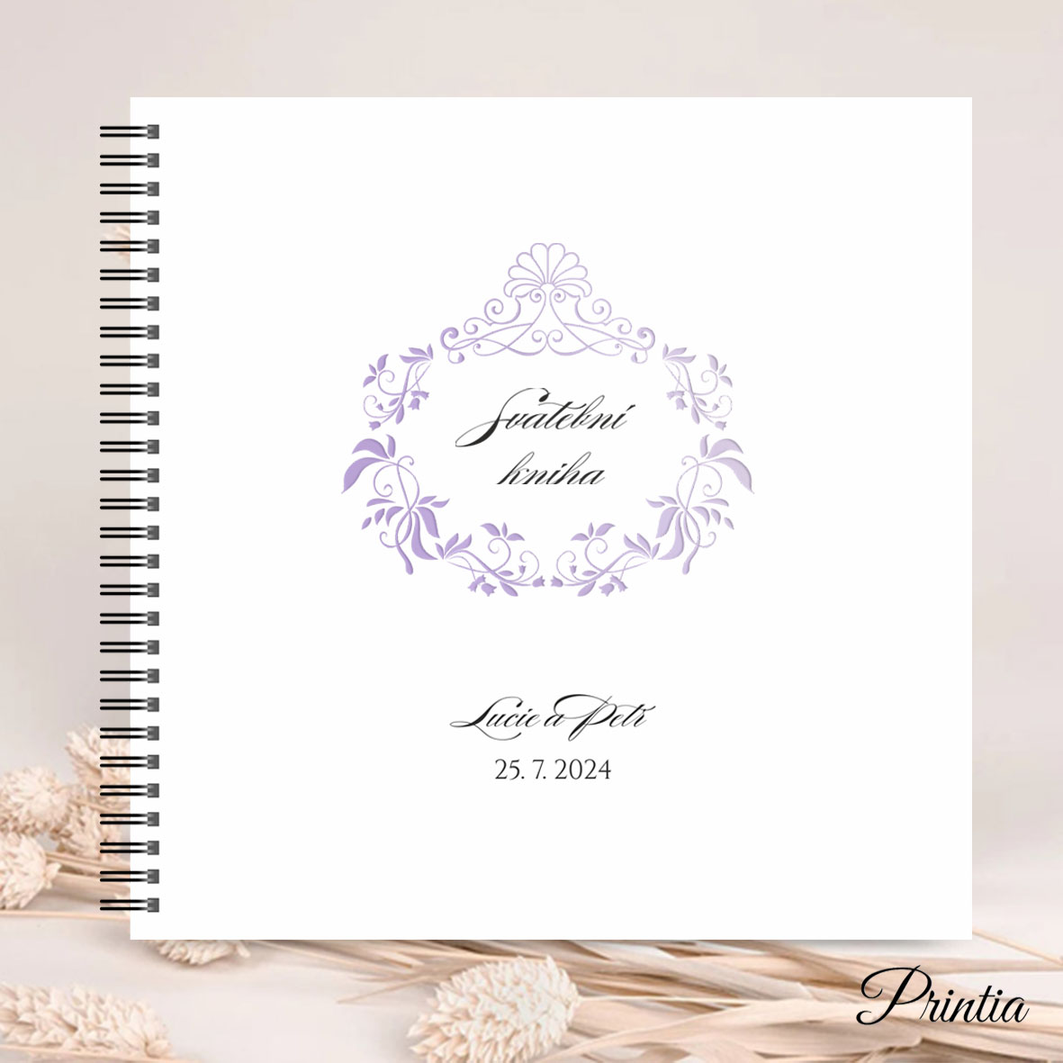 Wedding book with shiny purple ornament