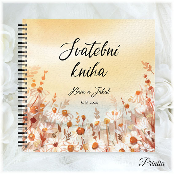 Wedding book with meadow flowers