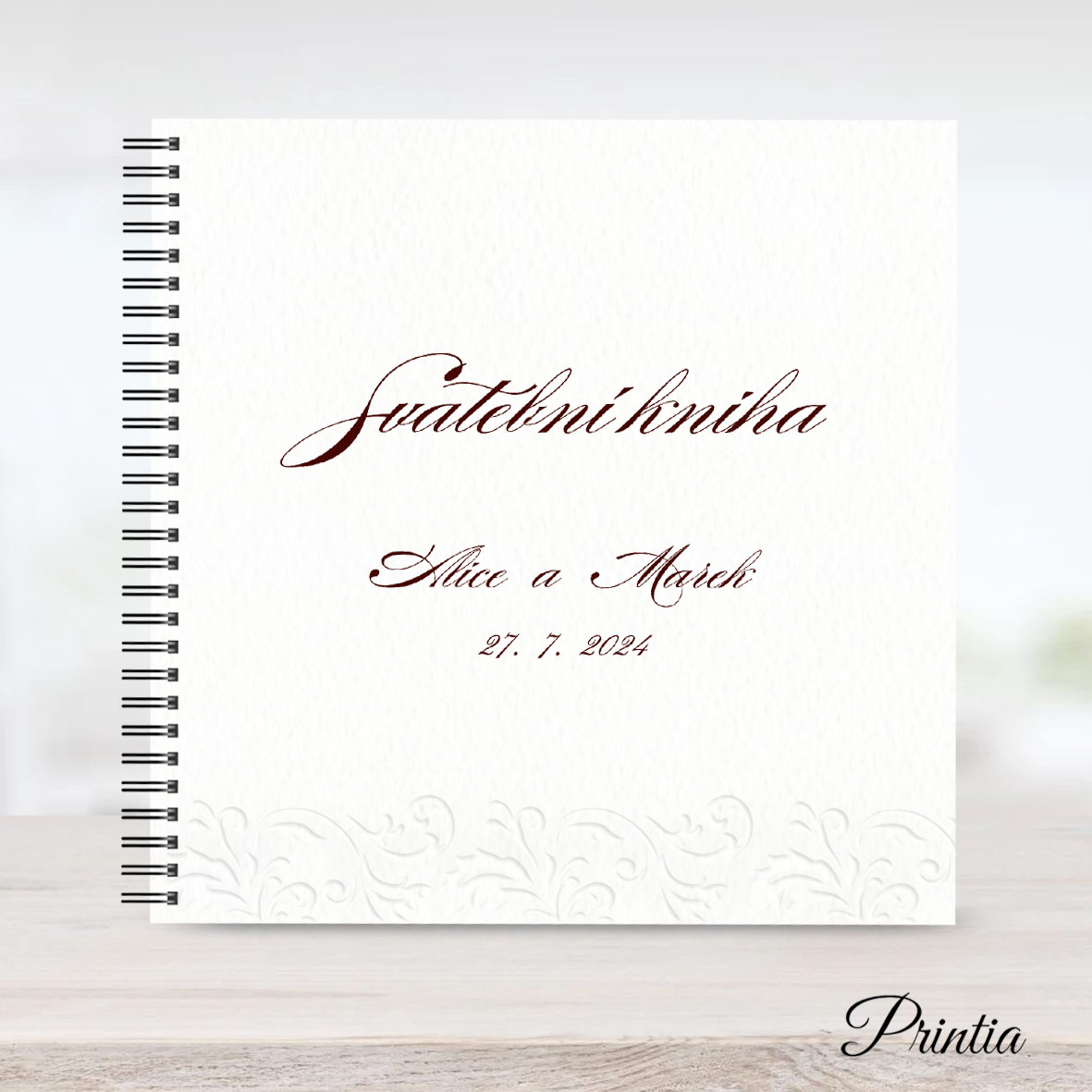 Wedding book with relief ornament