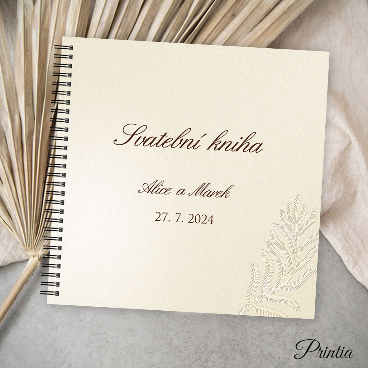 Wedding book with shiny feather