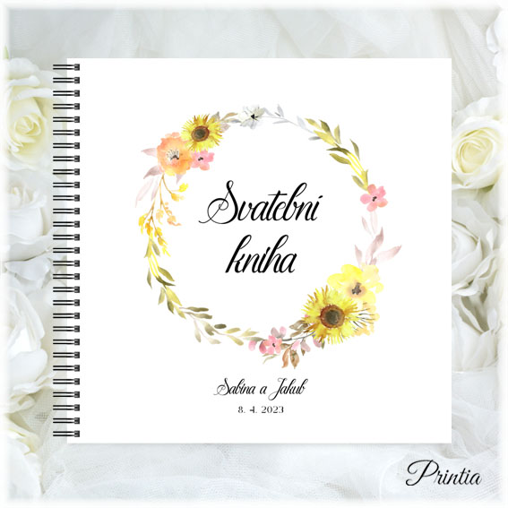Wedding book with a wreath of flowers and sunflowers