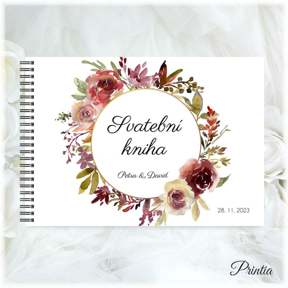 Wedding book with a wreath of autumn flowers