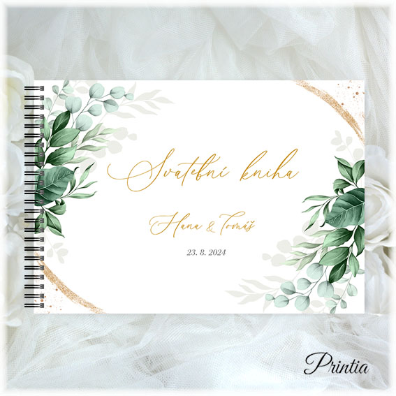 Wedding book with green leaves