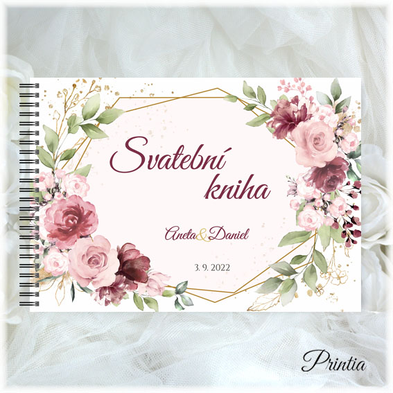 Wedding book with golden elements and flowers