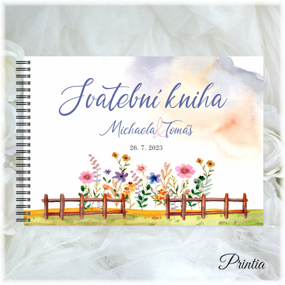 Wedding book with flowers behind the fence