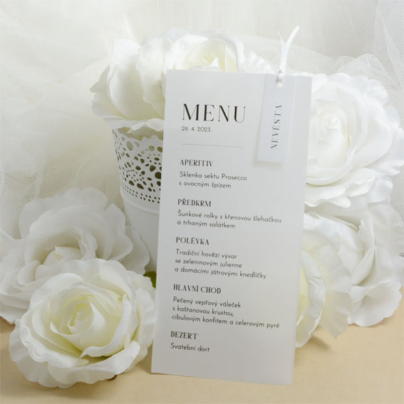 Wedding menu on semi-transparent paper with name card and ribbon