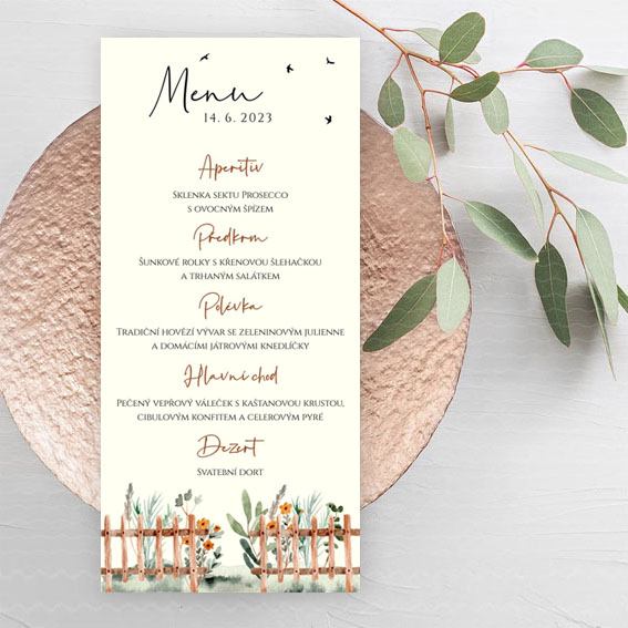 Wedding menu with flowers behind the fence