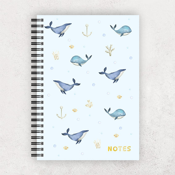 Spiral notebook with whales
