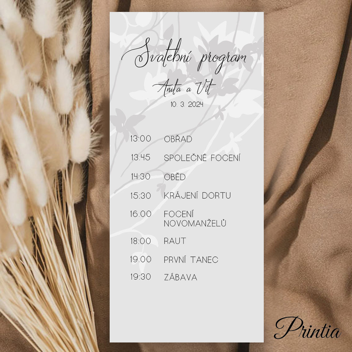 Wedding day schedule with a gray floral ornament