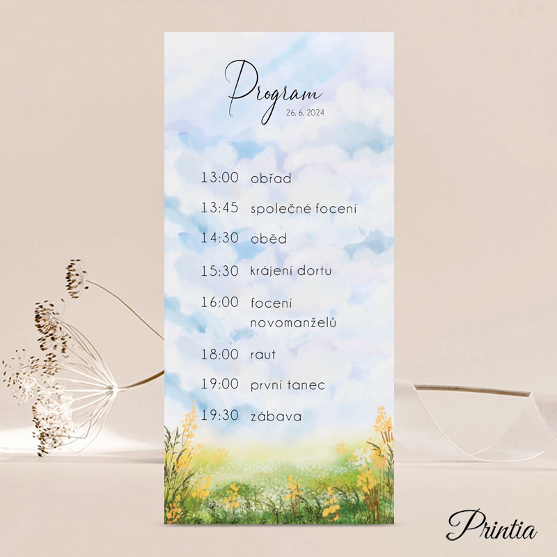 Wedding program with a meadow of yellow flowers