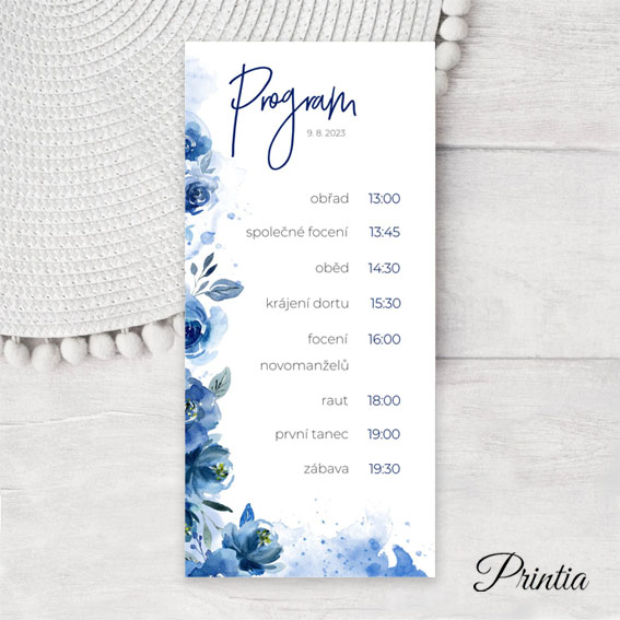 Wedding day program with blue flowers