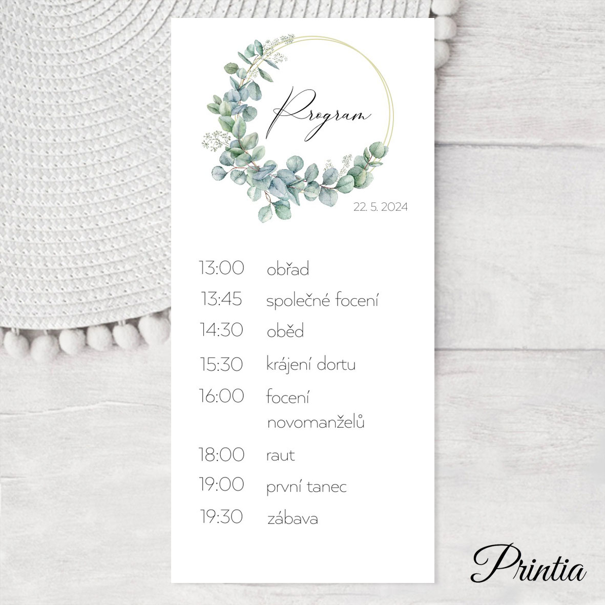 Wedding day schedule with eucalyptus