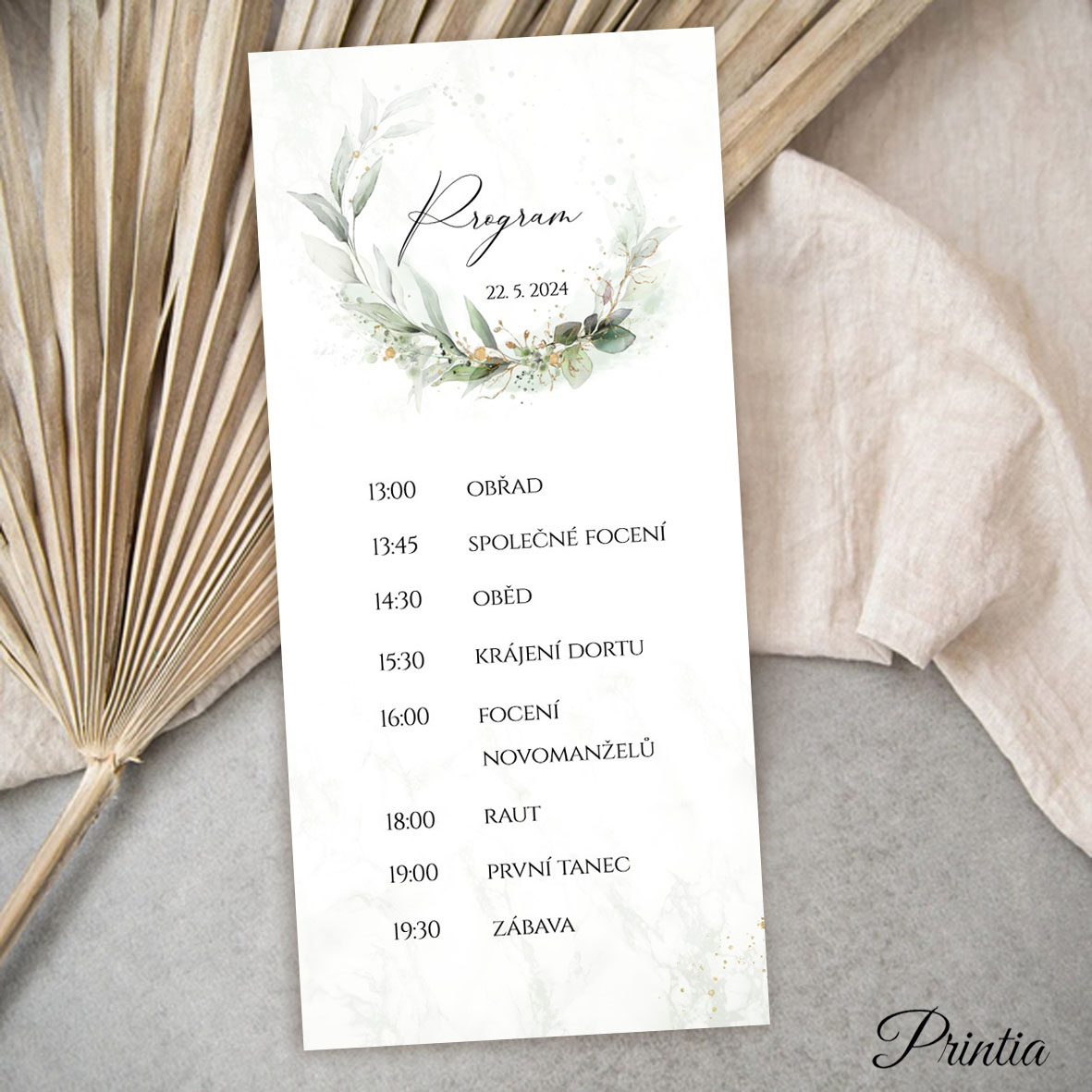 Wedding day timeline with plant wreath