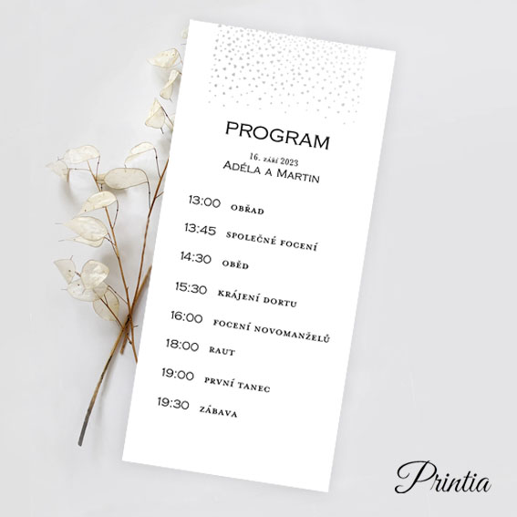 Wedding program with silver and rainbow embossed hearts