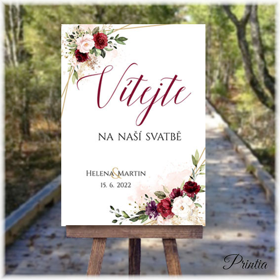 Wedding welcome sign with red flowers 