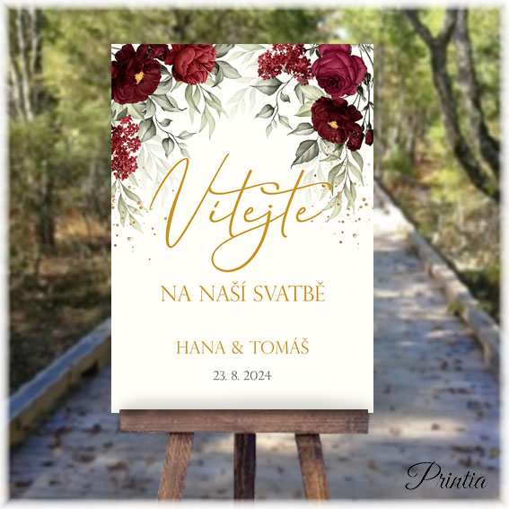 Wedding welcome sign with red flowers