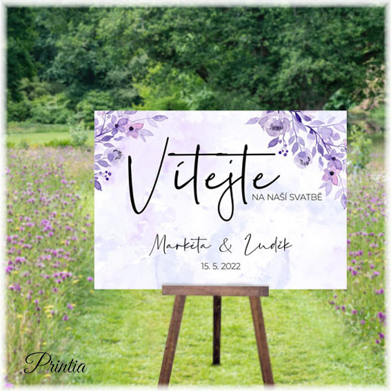 Welcome wedding sign with purple flowers