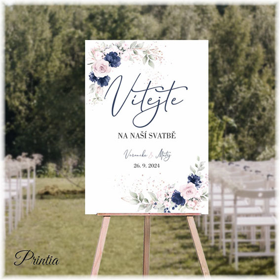 Wedding welcome sign with blue and pink flowers
