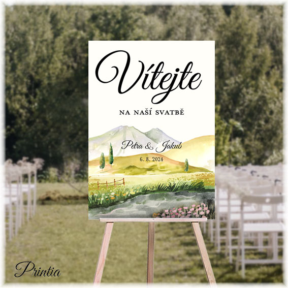 Wedding welcome sign with mountains and meadow