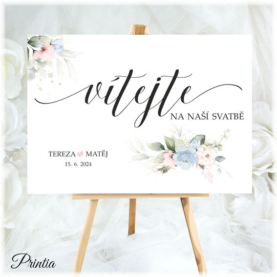 Wedding welcome sign with pink and blue flowers