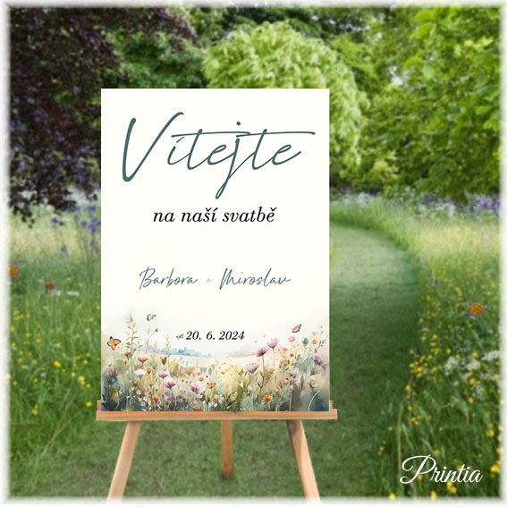 Wedding welcome sign with blooming meadow