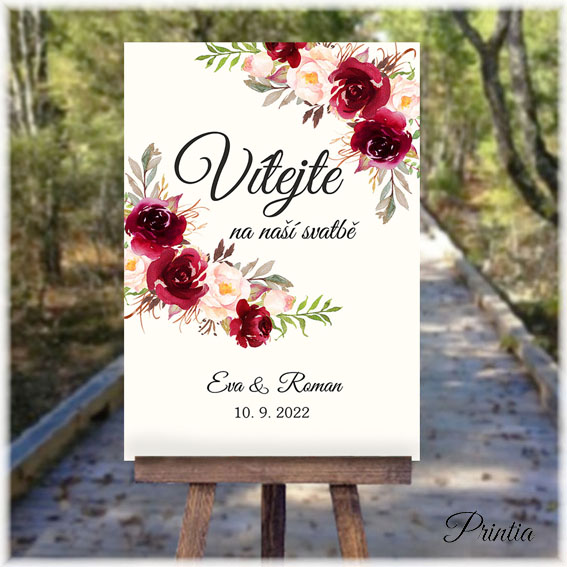 Wedding welcome sign with red flowers