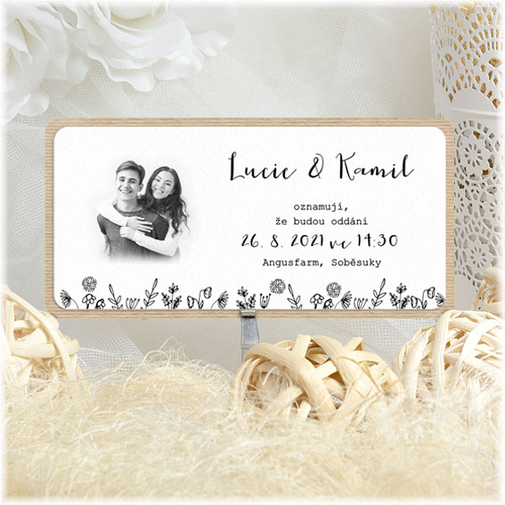 Wedding invitation with a photo taped with light kraft 