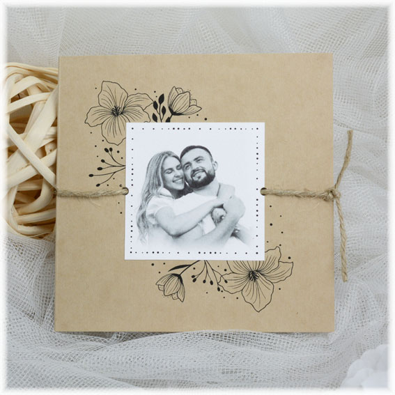 Opening wedding invitation with photo and string