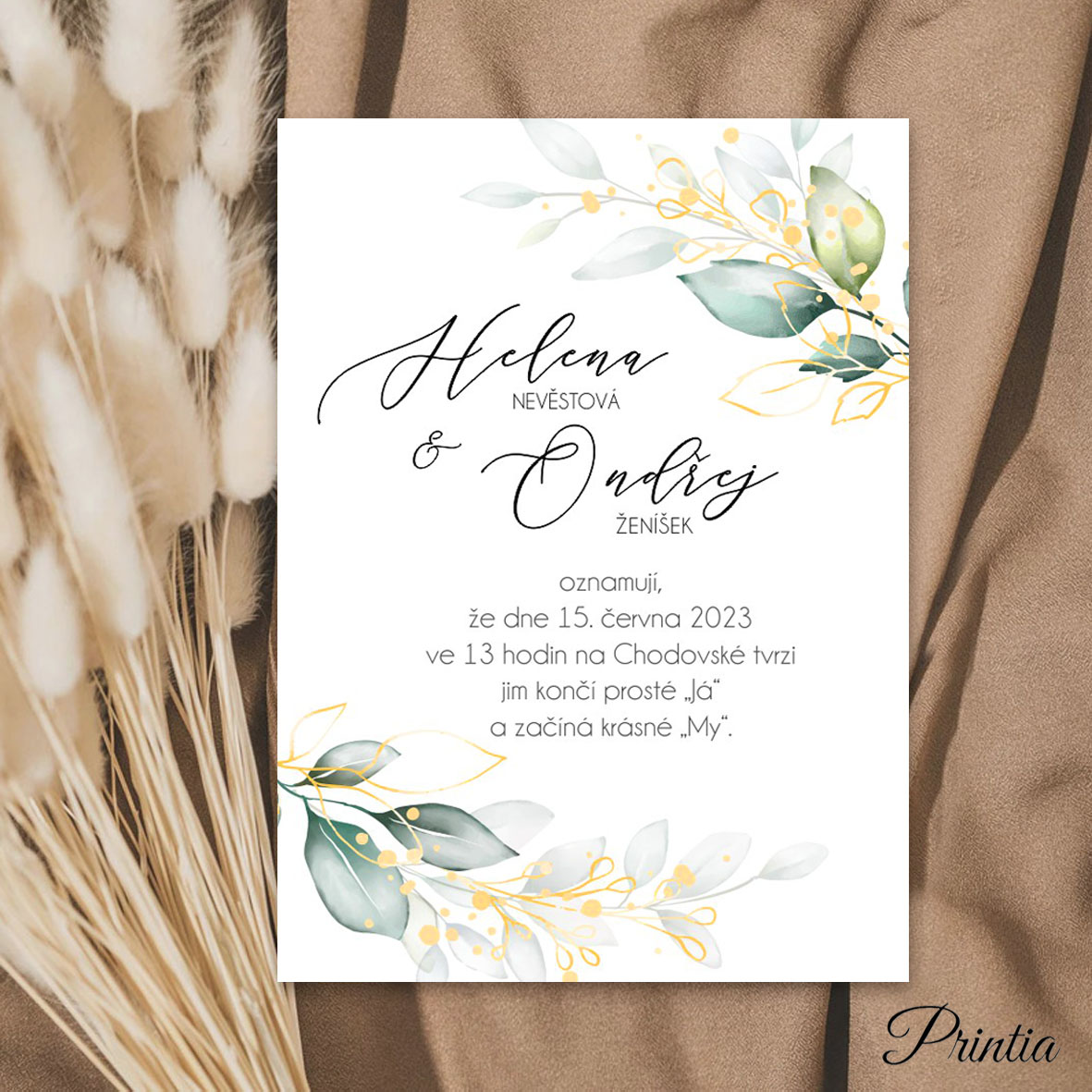 Wedding invitation with golden leafs