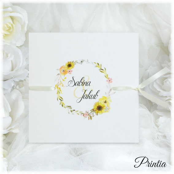 Opening wedding invitation with a wreath of flowers and sunflowers