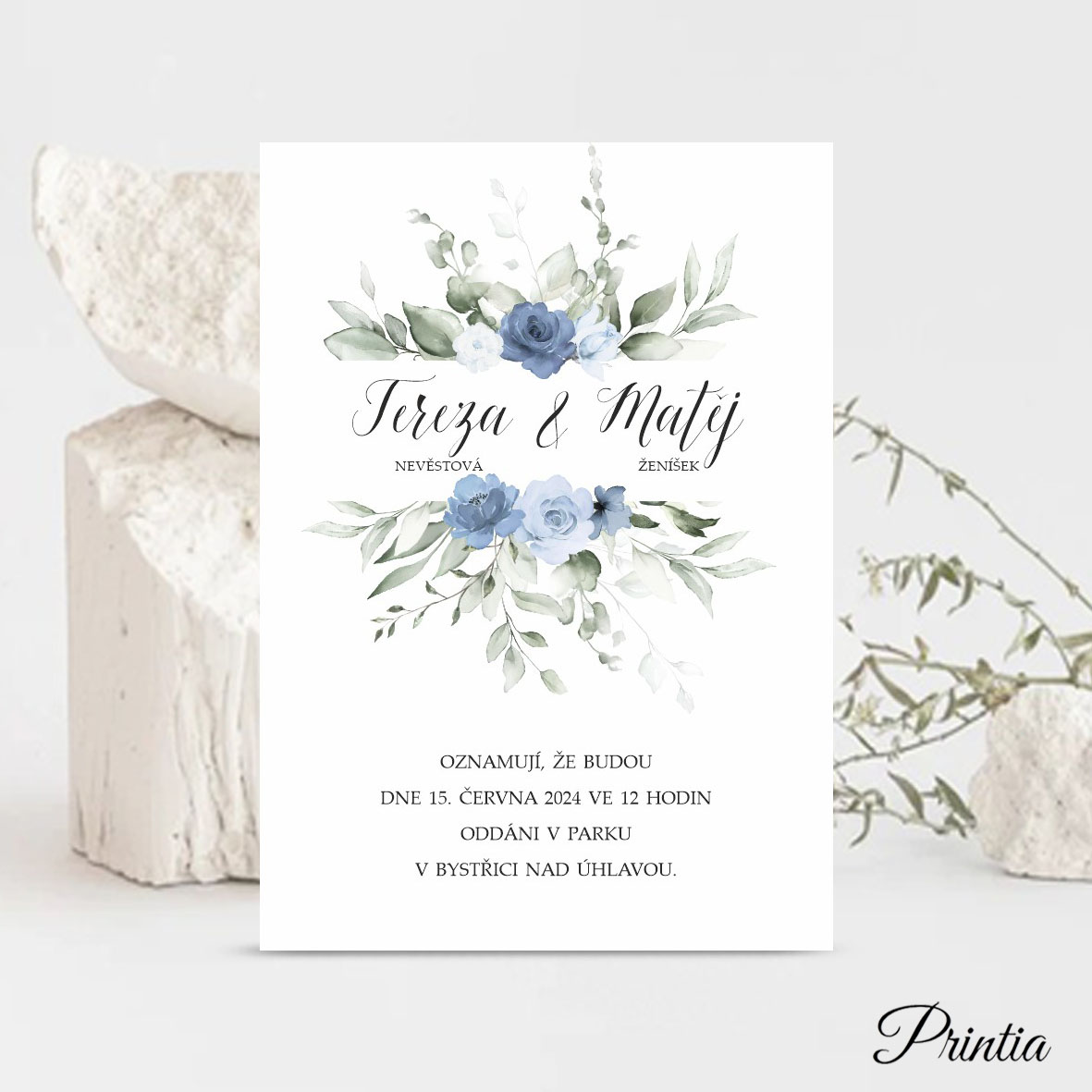 Wedding invitation with flowers in shades of blue