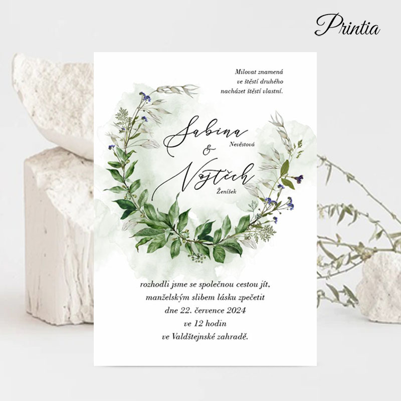 Wedding invitation with floral wreath