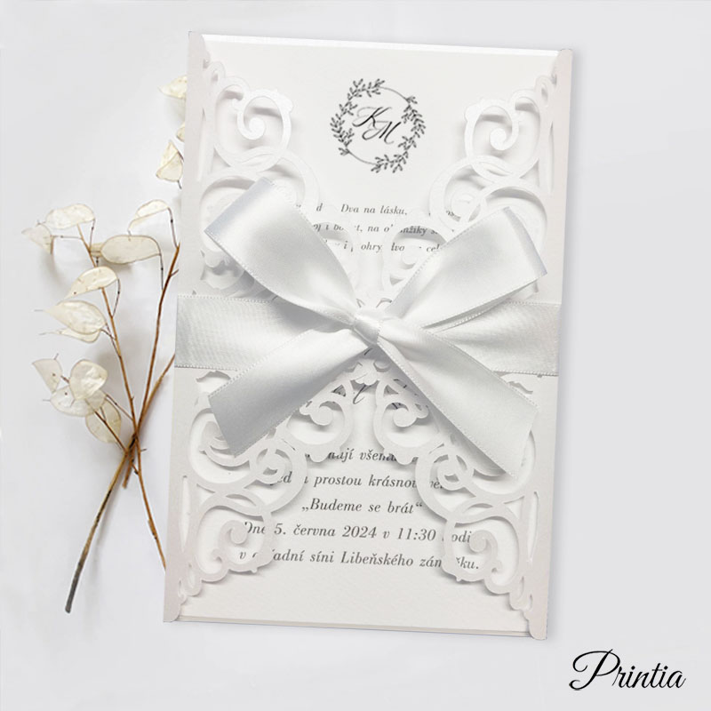 Wedding invitation with white ribbon and initials