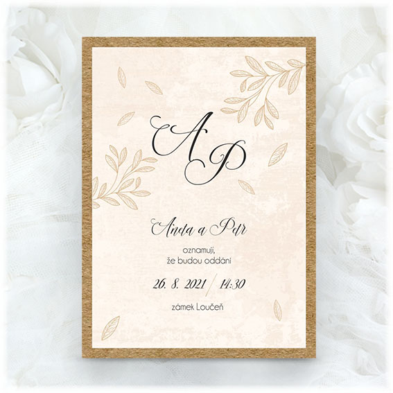 Cream wedding invitation with kraft paper underlay