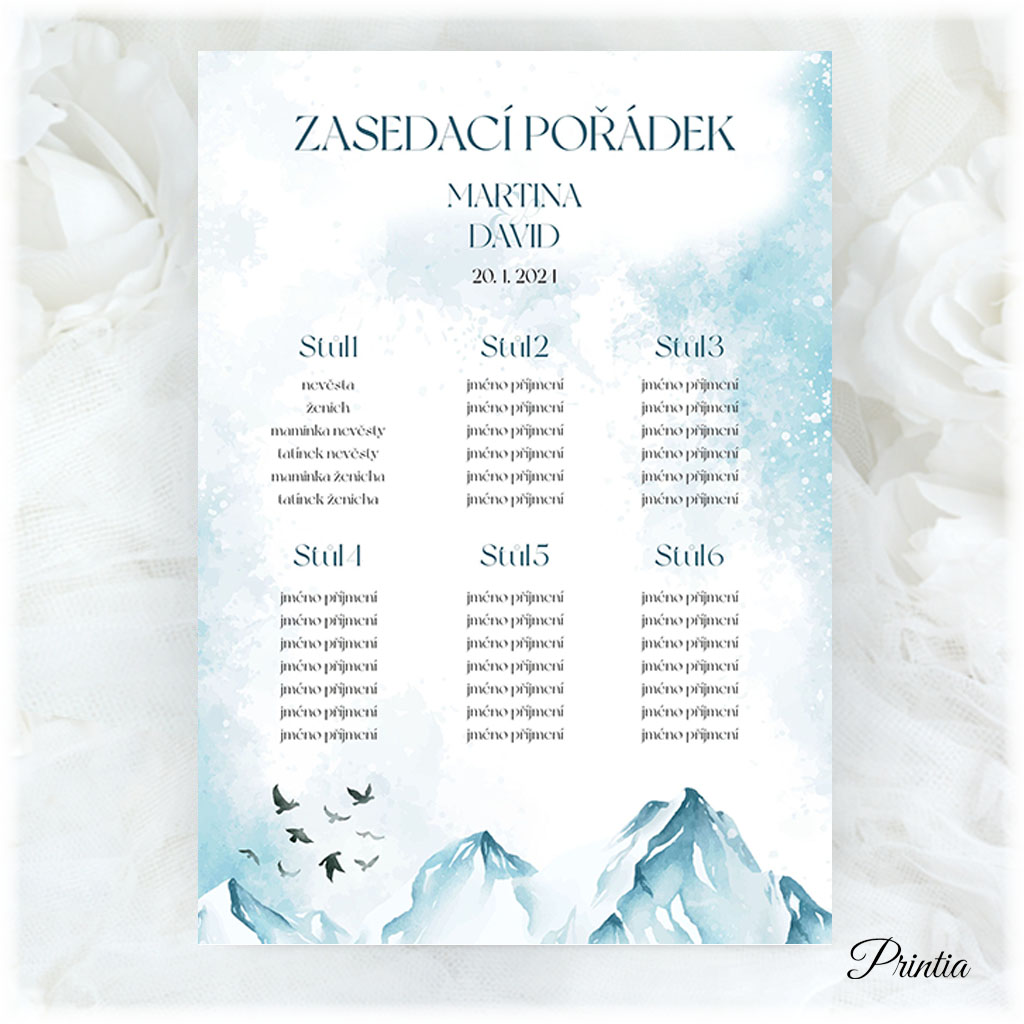 Wedding seating chart with a winter landscape